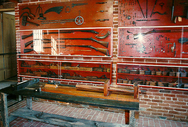 Inside the brick structure are a number of guns made by Jonathan and four generations of his posterity.