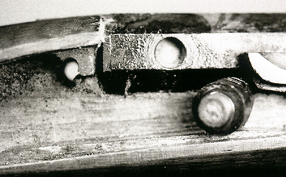 The breech and drum of this rifle were completely obstructed by a mud-dauber nest. Note also the corroded condition of the breech area, including prior neglect.